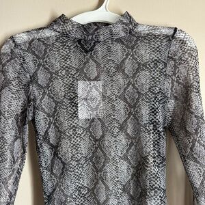 Black sheer going out top